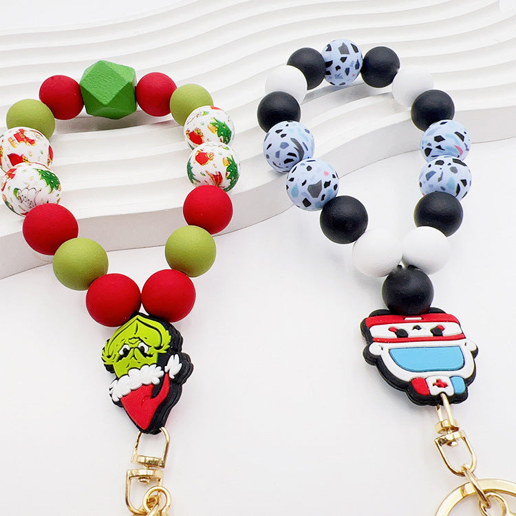 Wholesale Halloween Christmas Pumpkin Cow Ghost Dog Paw Silicone Beaded Tassel Wrist Keychain